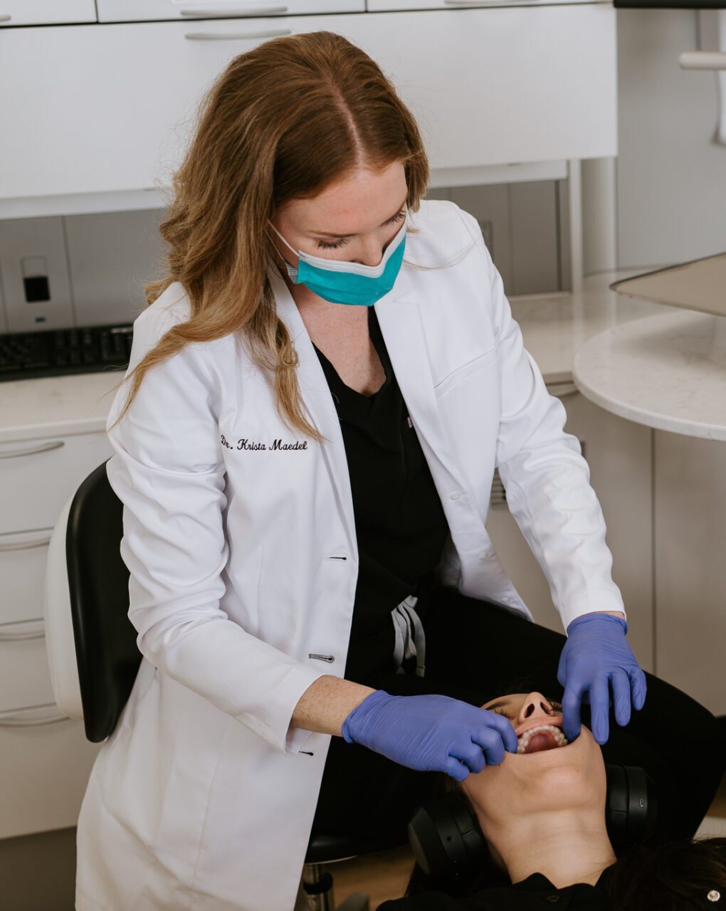 Dental Hygeine Dentists examining patient